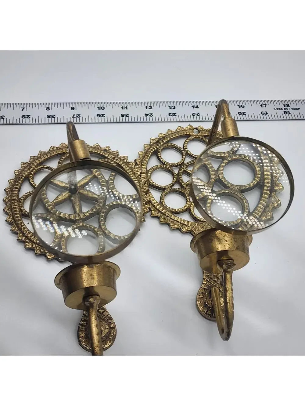 Pair of Brass Tone Wall Candle Sconces with Round Magnifying Glass Accent